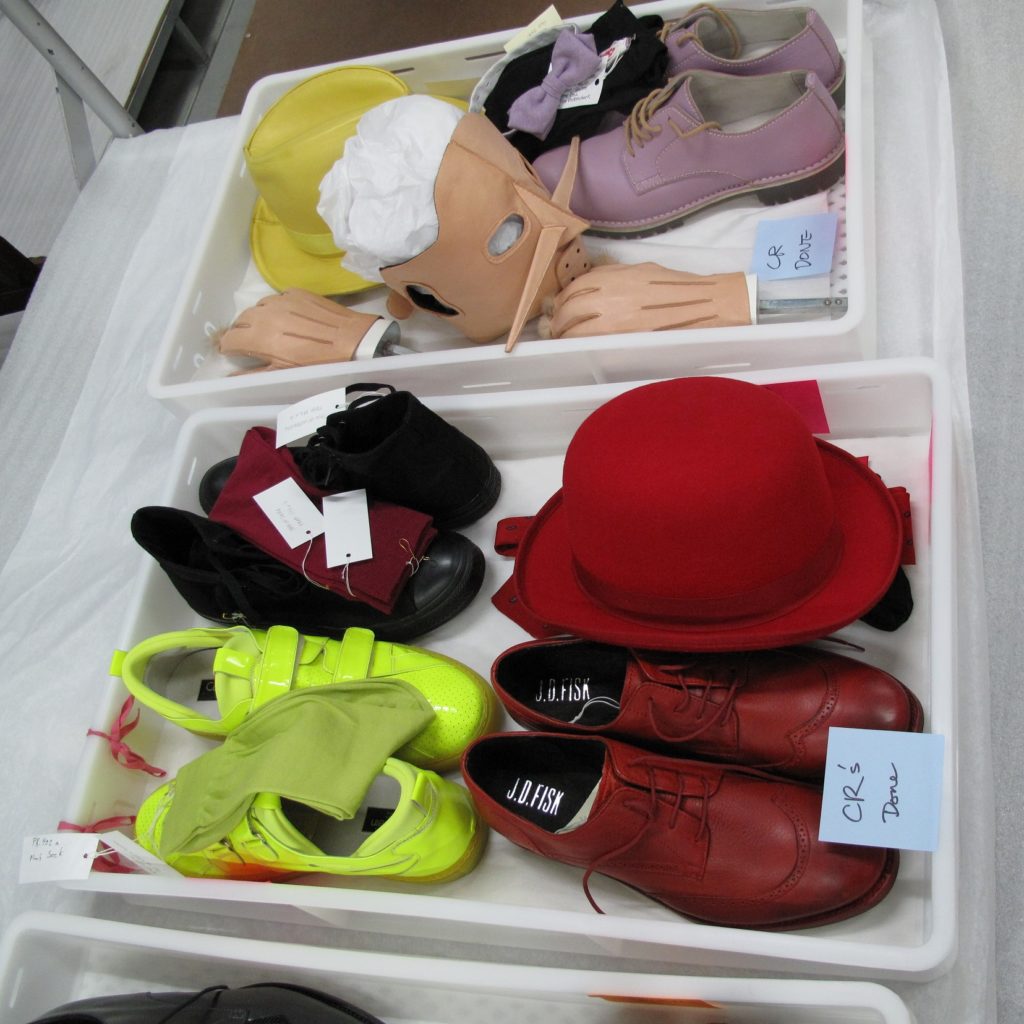 Photograph of trays holding accessories for the contemporary ensembles